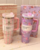 Stanley Quencher 40oz tumbler in Beaux Pink by LoveShackFancy, floral design with ergonomic handle and wide mouth lid