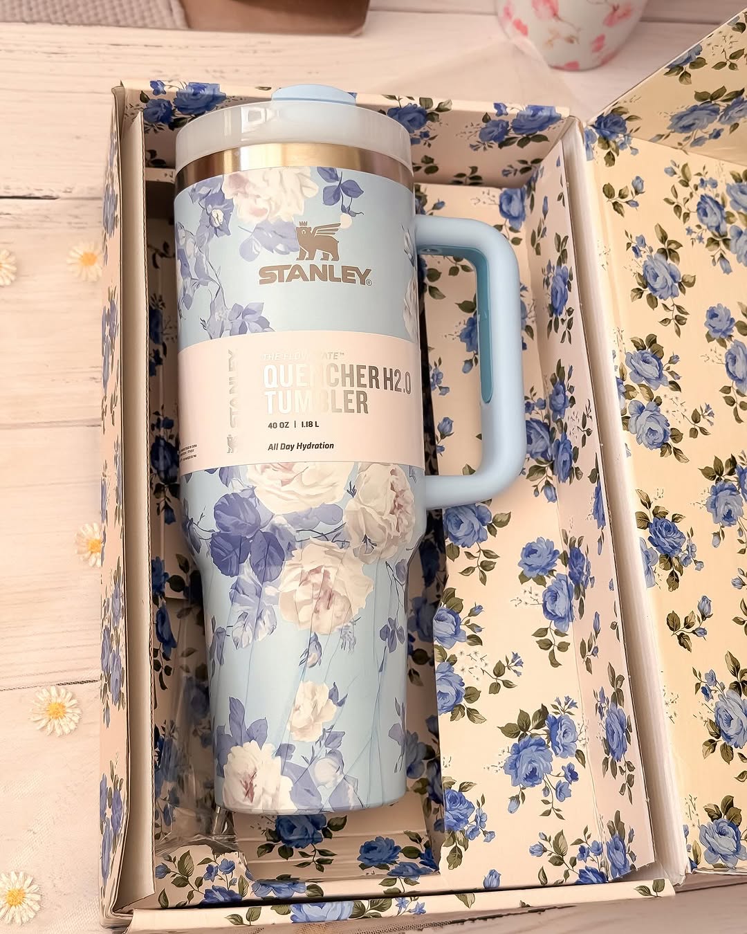 Floral-patterned Stanley tumbler in a decorative box with floral design