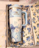 Floral-patterned Stanley tumbler in a decorative box with floral design