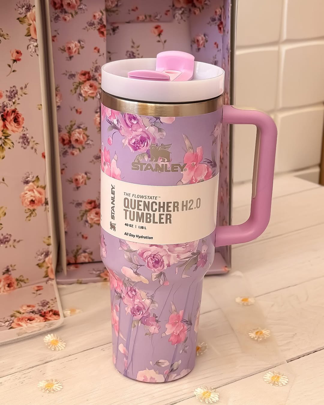Limited edition LoveShackFancy Stanley Tumbler with romantic floral motifs and practical handle, perfect for hydration in style