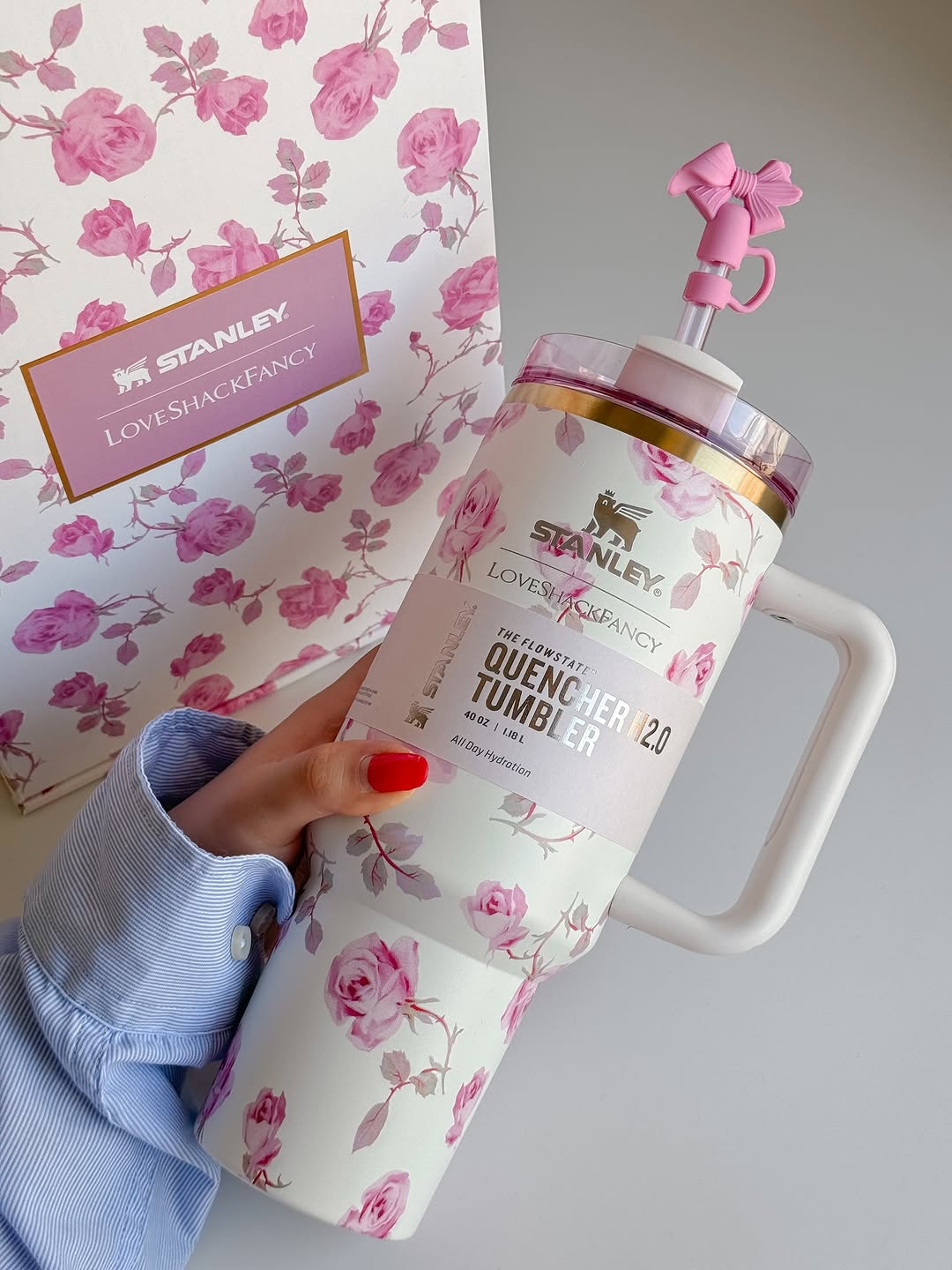Close-up of pink bow tied to LoveShackFancy Stanley tumbler handle, emphasizing feminine aesthetic