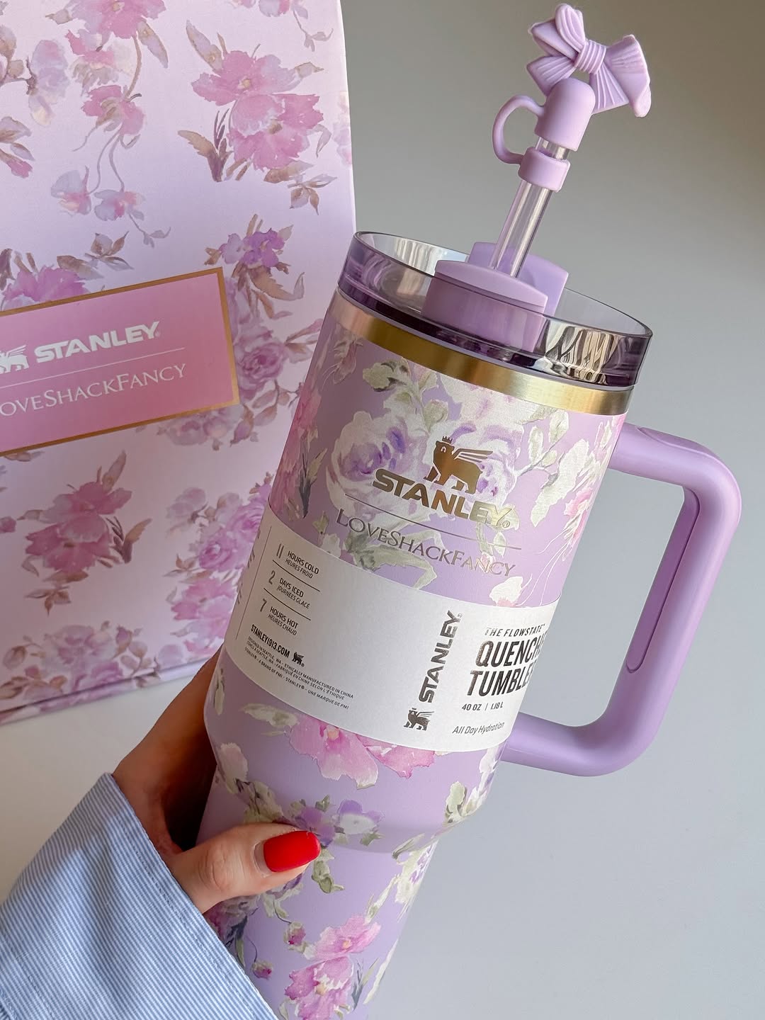 Pink floral Stanley x LoveShackFancy Quencher 40oz cup close-up showing leak-resistant lid and pretty print