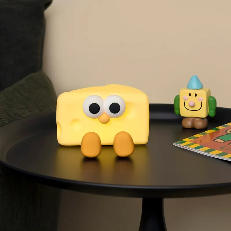 Cheese night light used as a mobile phone stand