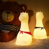 Giraffe with Scarf silicone night light placed in a kids’ bedroom, enhancing the cozy and playful atmosphere.