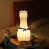 Giraffe silicone night light displaying 7 color modes, with a focus on its vibrant hue transition