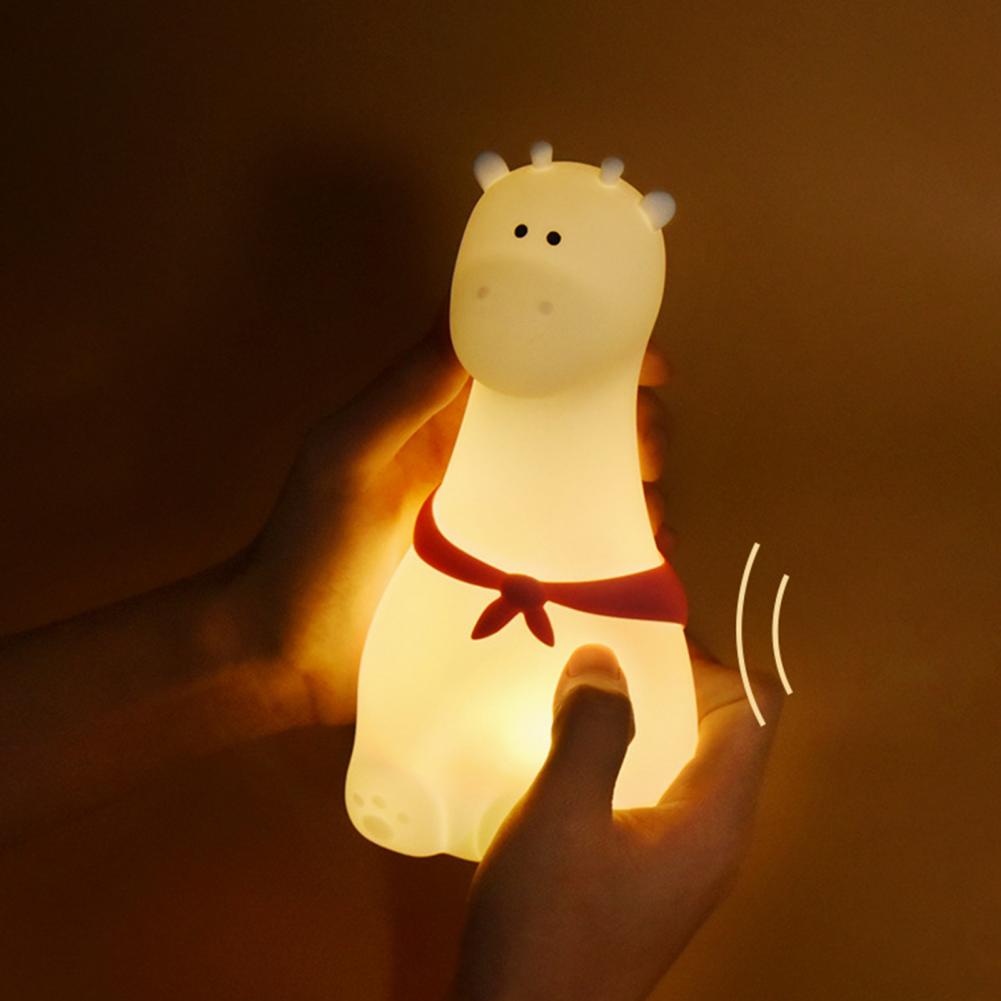 Giraffe with Scarf silicone night light used as a charming decorative piece in home decor