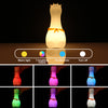 Giraffe silicone night light showcasing all 7 color options in a vibrant display.