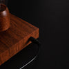 Close-up of the Mahogany finish on the Palatial Levitating Magnetic Lamp, showing the high-quality craftsmanship