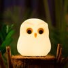 Owl Night Lamp glowing softly in a child's bedroom