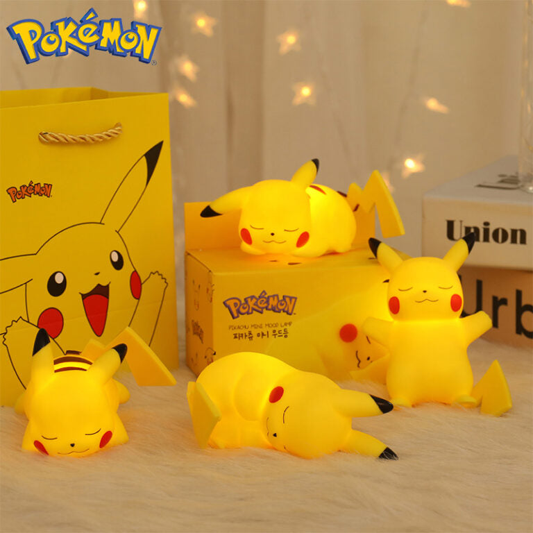 PikaGlow Pokémon Pikachu Night Light glowing on a desk setup