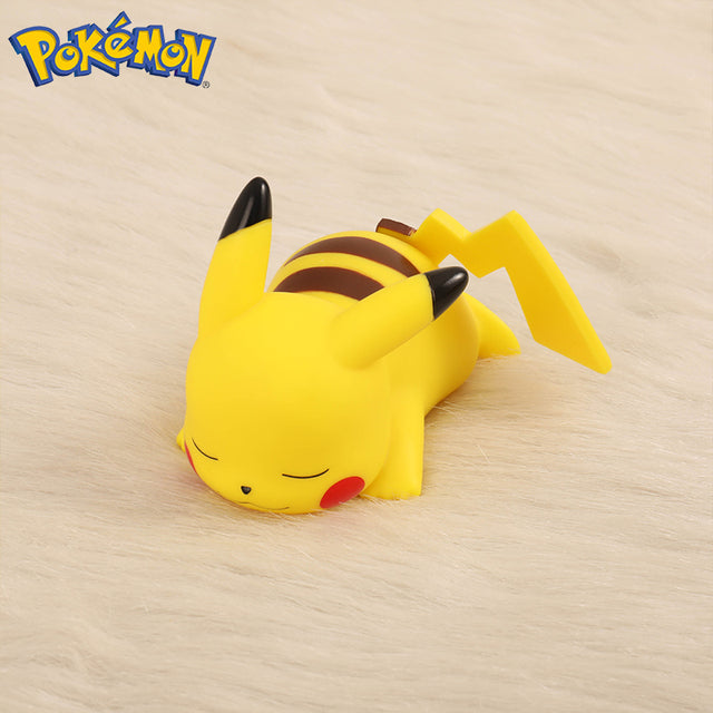 Adorable Pikachu night light illuminating a child's bedside table