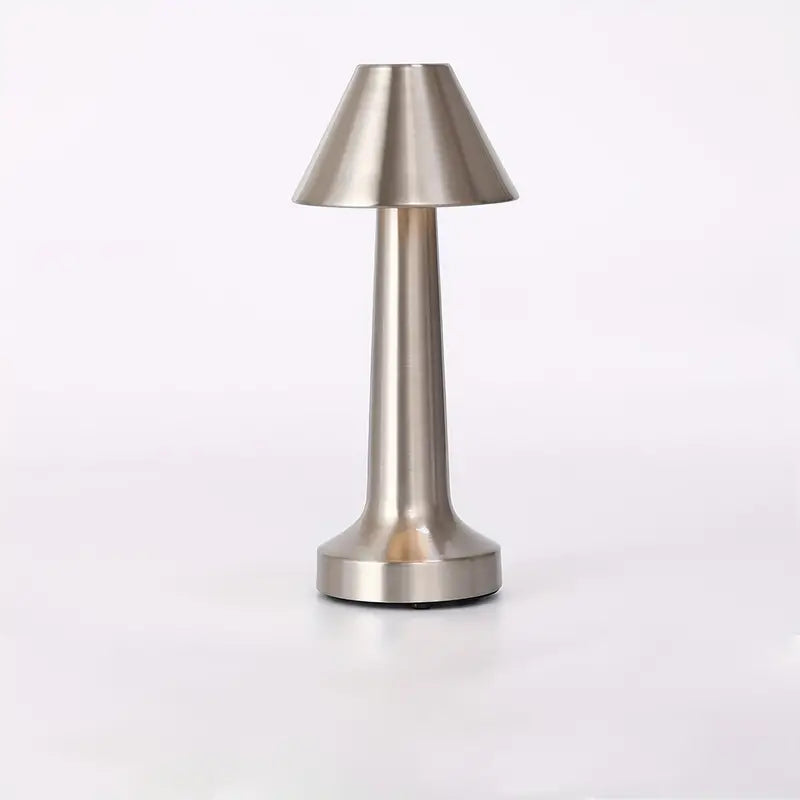 Battery-powered cone-shaped lamp for versatile decor in bedrooms