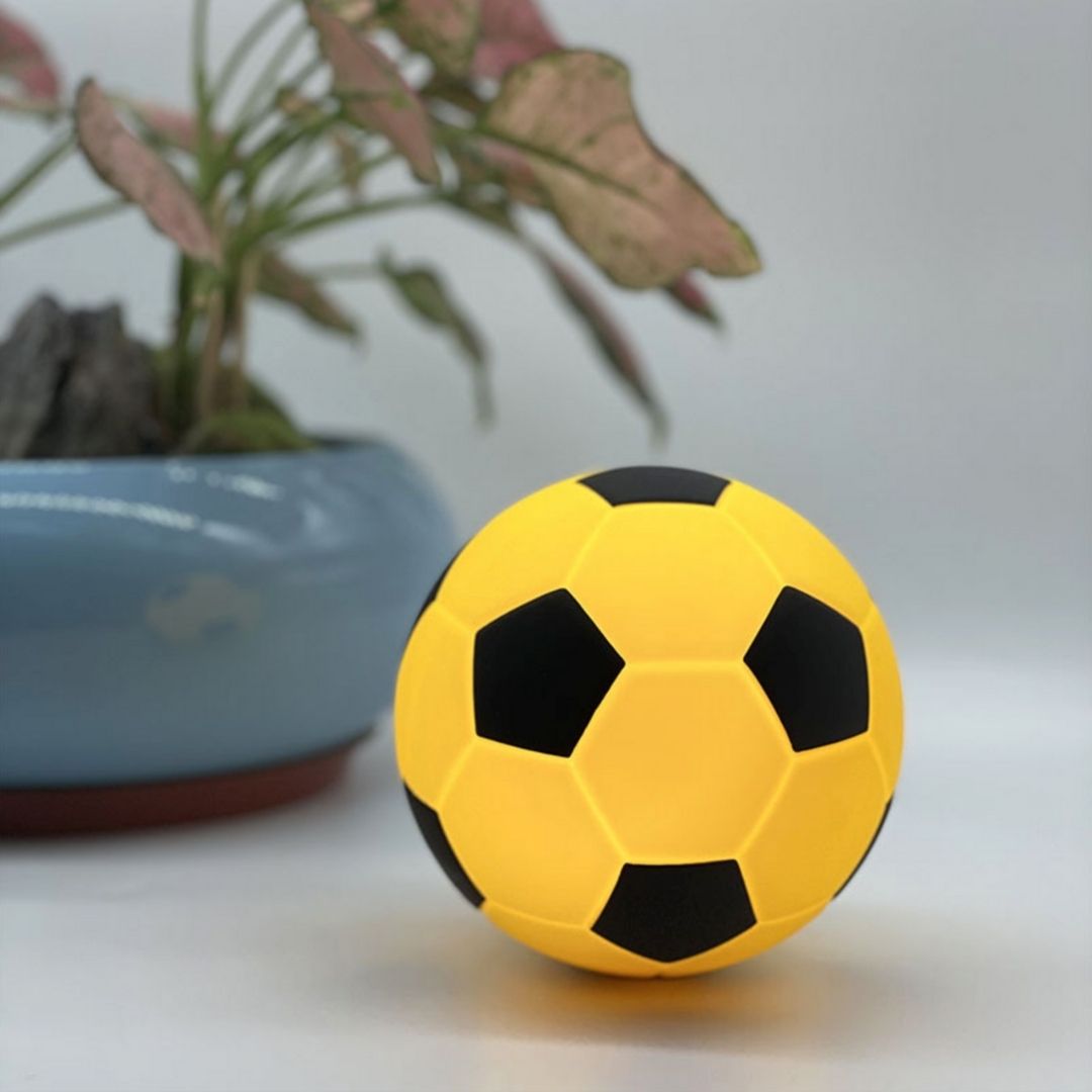 Kids bedside lamp in the shape of a soccer ball