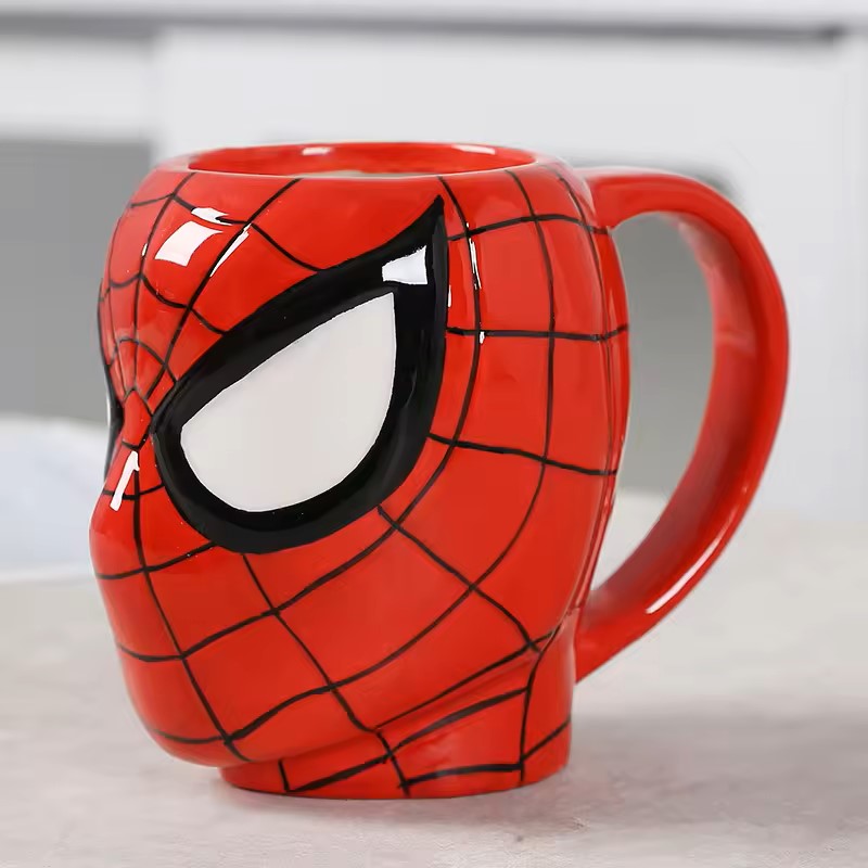 Superhero Ceramic Coffee Mug - A vibrant red mug featuring iconic superhero imagery, perfect for Marvel fans and coffee enthusiasts